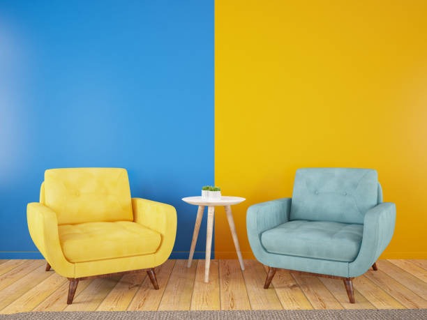 対照的なカラーリングの壁と椅子